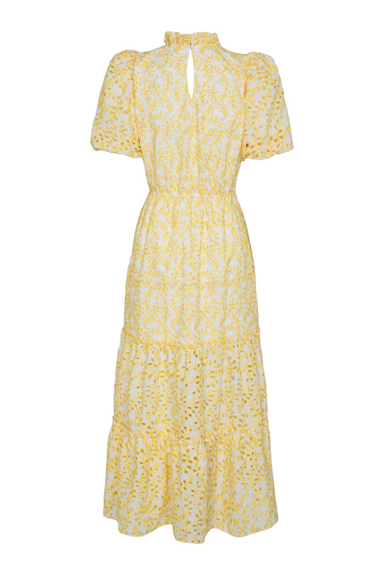 Vestido marca Mimoki bordado amarillo. Femenino y romántico con estilo español. Manga corta y abullonada y falda con volantes. Disponible en alquiler para bodas, fiestas, eventos, bautizos.