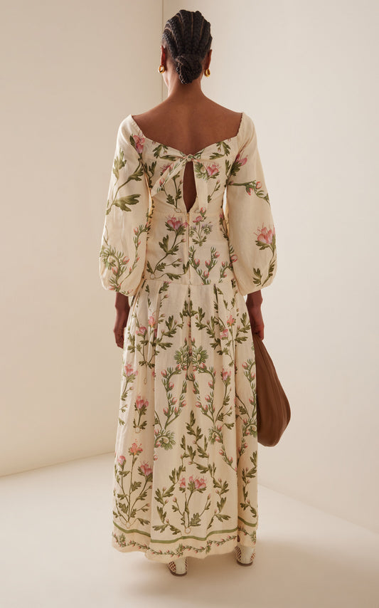 Vestido de manga larga perfecto para boda de primavera y boda de otoño y boda de verano. Mana abullonada y estampado floral. Femenino y romántico. Espalda descubierta.
